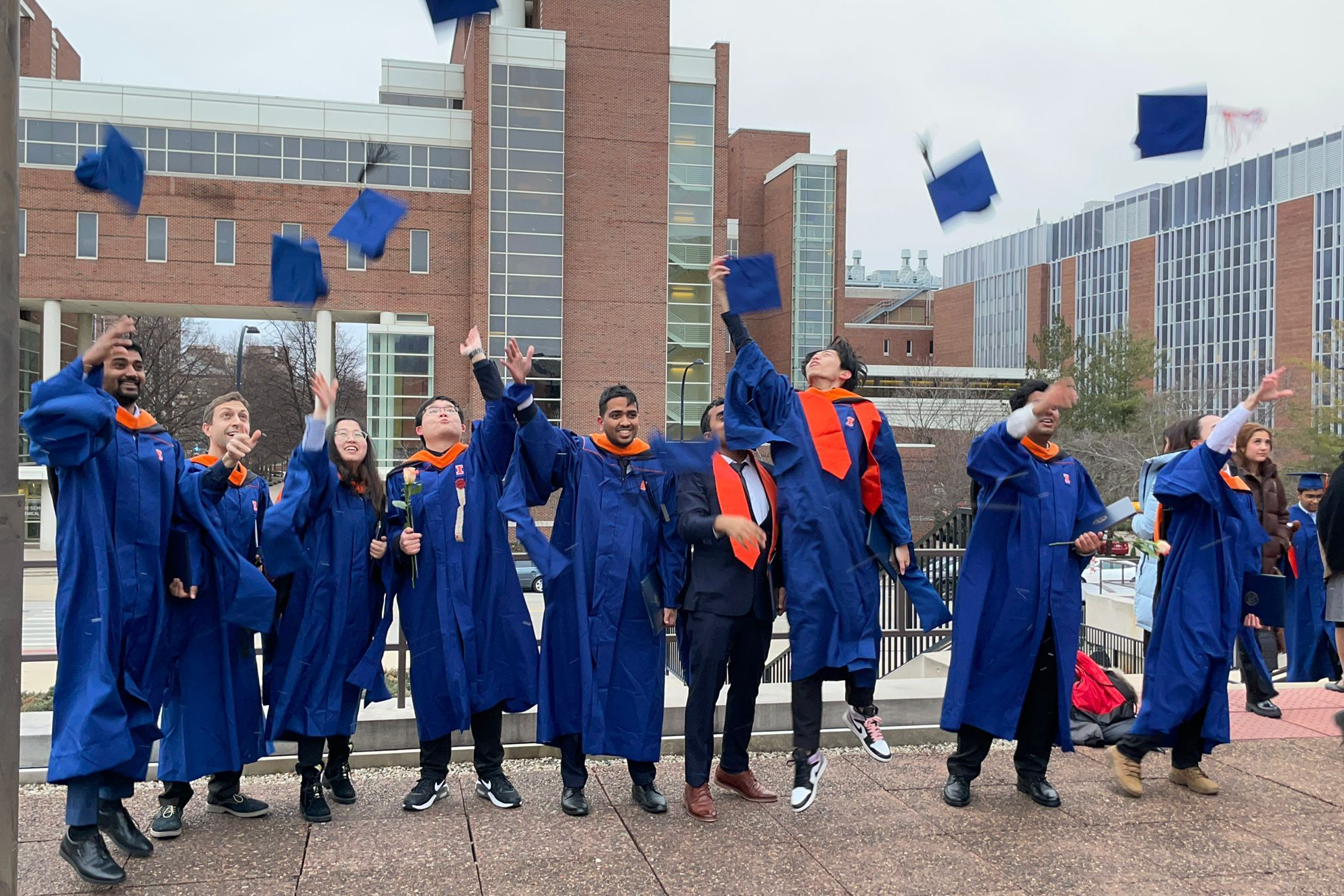 Students celebrate their graduation from the program.