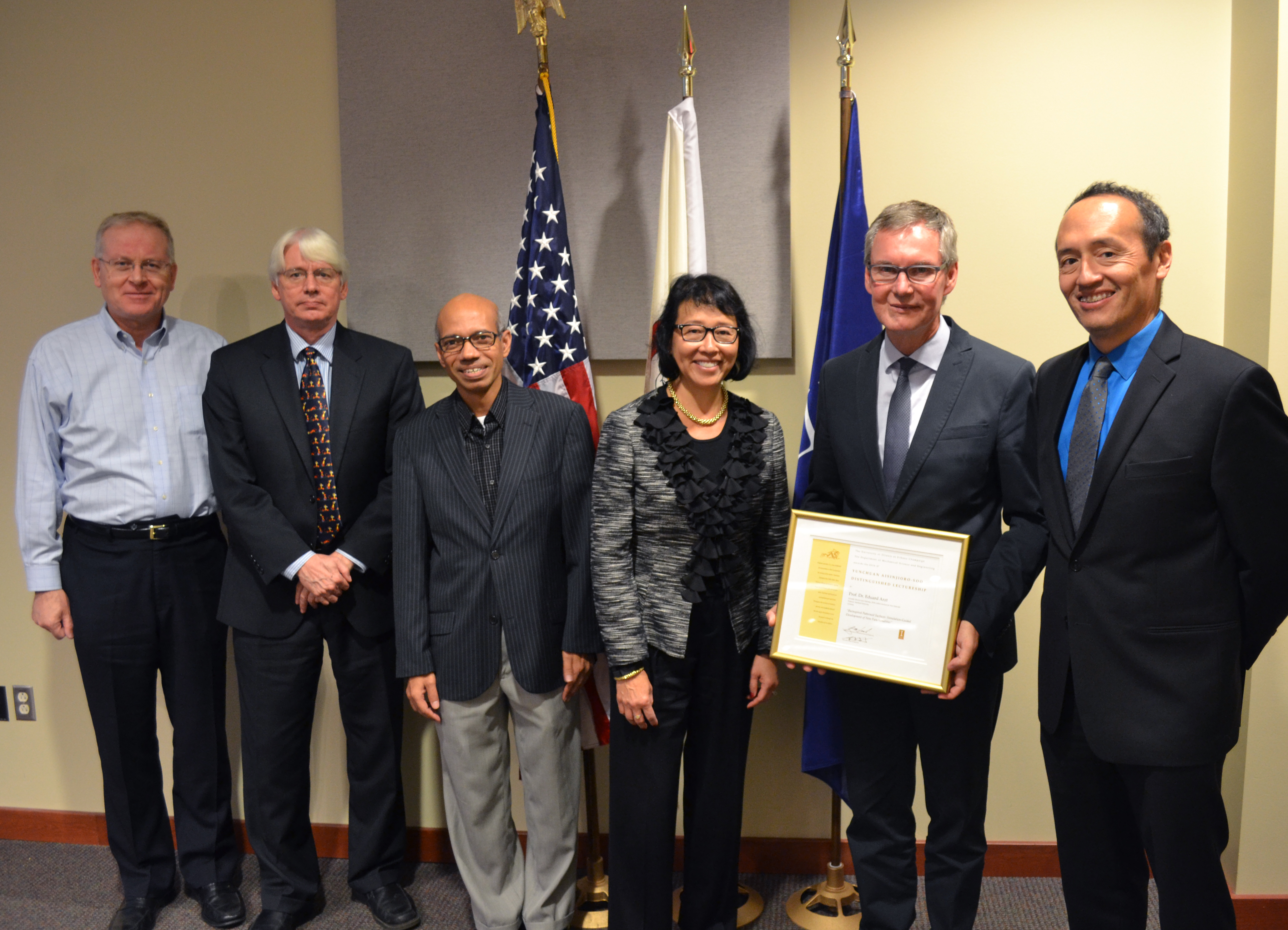Arzt stands with co-host Professor Petros Sofronis, Department Head Tony Jacobi, co-host Professor Taher Saif, and Shirley A. Soo and Dr. David D. Soo, children of Shao Lee and Hermia Soo.