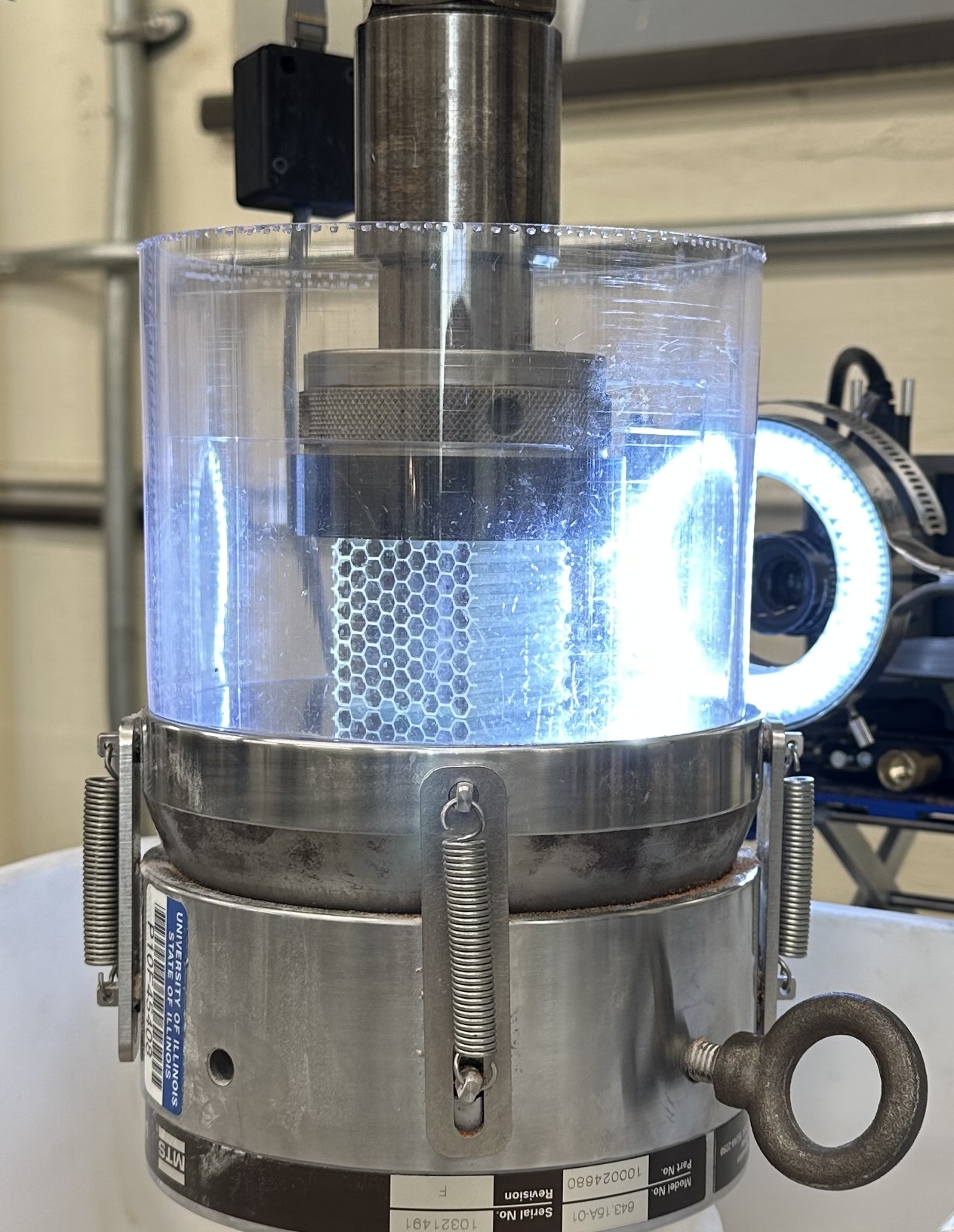 Varied configurations of lattice structure and granular media were tested under compression.