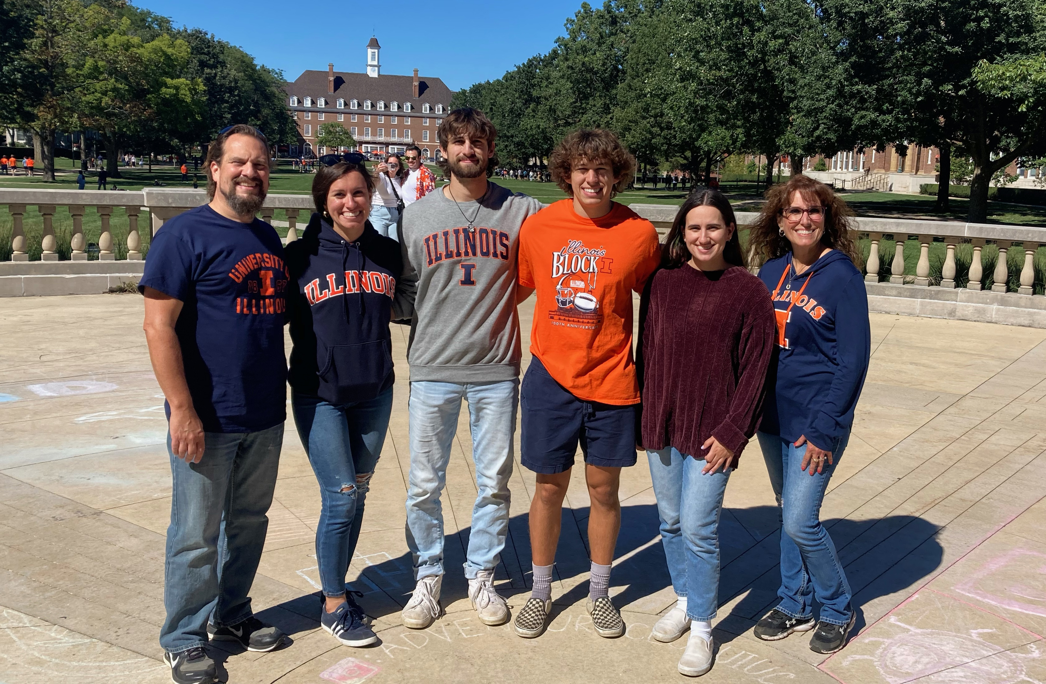 Tonarelli family on the steps of Foellinger Auditorium