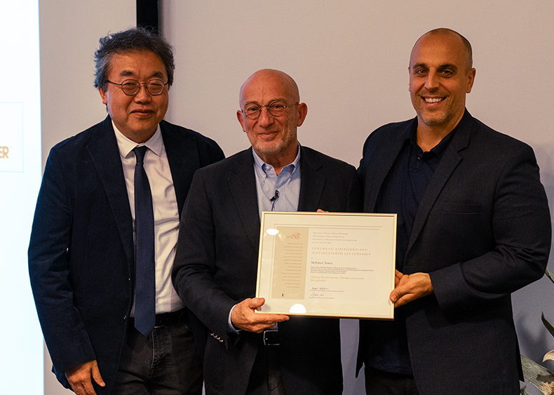 Bumsoo Han, Mehmet Toner, Nenad Miljkovic holding a framed certificate presented to Dr. Toner.