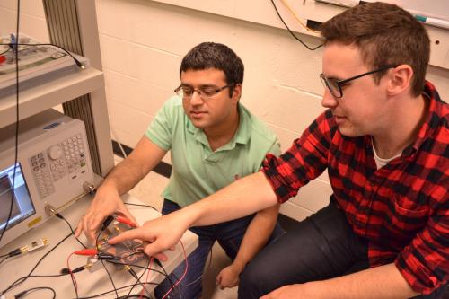 Bahl and Peterson in the lab. 
