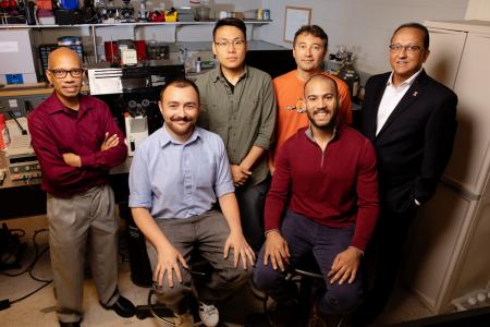 The research team includes, from left, professor Taher Saif, graduate student Onur Aydin, graduate student Xiastian Zhang, professor Mattia Gazzola, graduate student Gelson J. Pagan-Diaz, seated, and professor and dean of the Grainger College of Engineering, Rashid Bashir. Photo by L. Brian Stauffer.