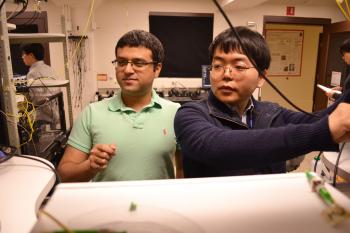 MechSE associate professor Gaurav Bahl, left, and graduate student Seunghwi Kim confirmed that backscattered light waves can be suppressed to reduce data loss in optical communications systems.