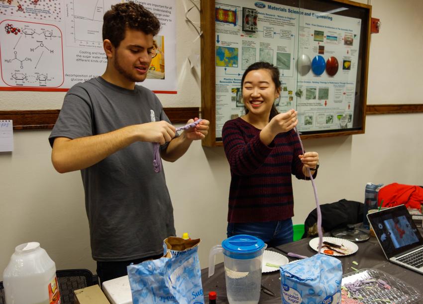 Students demonstrate sugar science using taffy