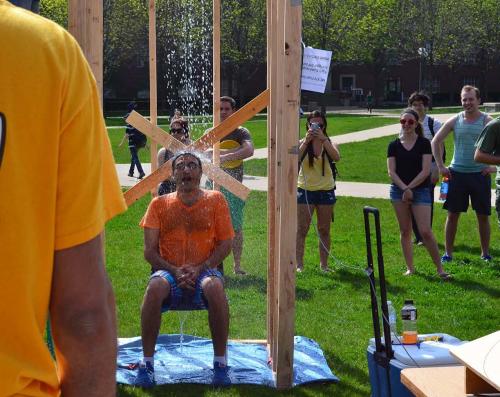Tawfick gets drenched by his students during the final &quot;Dunk Your Professor&quot; competitions for the Spring 2014 ME 370 course.