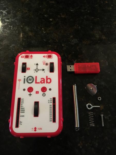 The IOLab device comes with accessory components for various data collection.