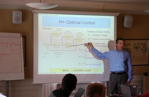 Wise in 2008 conducting a workshop on robust adaptive control in the oil drilling industry.