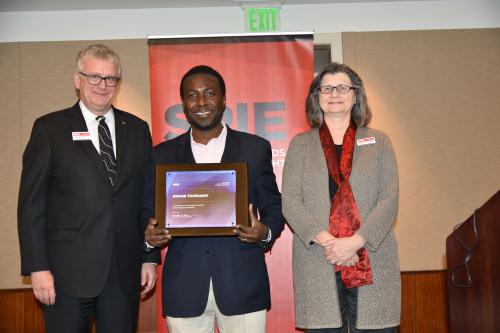 Kimani Toussaint receives SPIE Fellow honor.