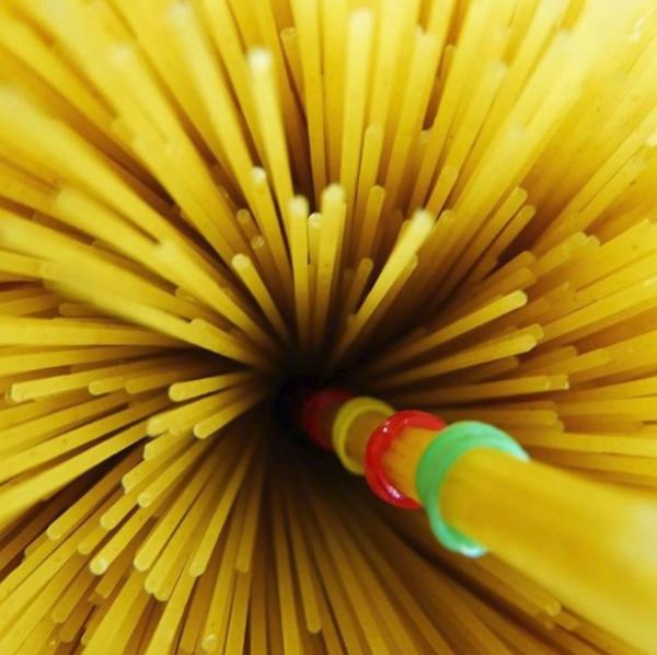 Molecular Rubber Band: â€œNeurons extend branches to communicate. At the core of these branches, long strands of polymerized proteins called microtubules (symbolized by the spaghetti) facilitate the transport of biomolecules. Super-resolution microscopy reveals that another protein, actin, polymerizes to form periodic rings (symbolized by the rubber bands) at the cortex of these branches. We show that actin rings interact with motor proteins to exert a circumferential tension, regulating branch diameter, microtubules spacing, and biomolecule transport.â€