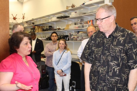 Professor Naira Hovakimyan (left) and her research group host Deputy Secretary of Defense Bob Work.