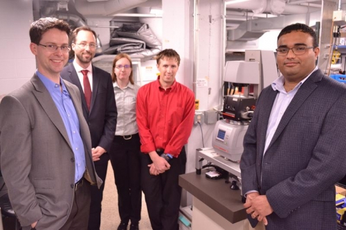 Ewoldt, left, with representatives from Anton Paar.