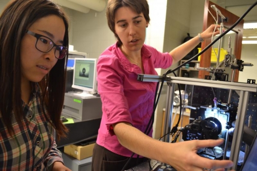 Weisensee, right, in the lab with fellow grad student Tianyu Yang.