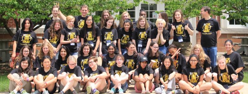 Pakeltis (back row, far right, two thumbs up) has fun with this year's campers.