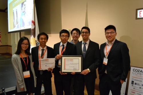 Garrett Chou, second from left, celebrates with his team after their Grand Prize win at the Cozad New Venture Competition.