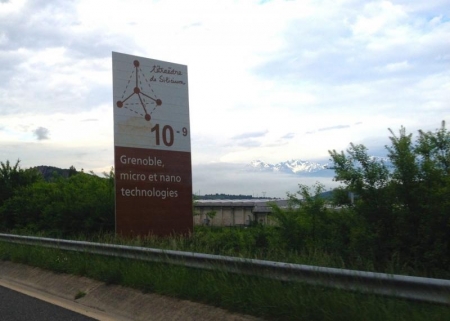 Grenoble is known for its expertise in micro- and nano-technology innovation. This unique road sign welcomes visitors to the city with the atomic structure of silicon. TÃ©traÃ©dre de silicium means â€œsilicon tetrahedron.â€ The Alps can be seen in the background.