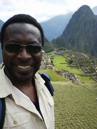 Toussaint poses in front the famous Incan ruins of Machu Picchu. His travels included a trip to Peru this past summer. 