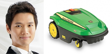 MechSE's Junho Yang and a John Deere Tango lawn mower.