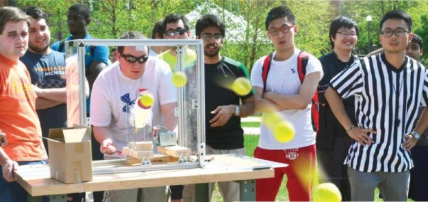 What a class: accurate ball launching = drenched professor.