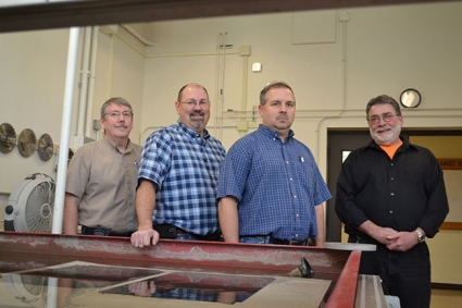 (Left to right) Jeff Smith, Gary Sedberry, Kyle Cheek, and Cliff Gulyash of MechSE's machine shop.