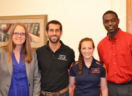 ExxonMobil's Amber Massingill (left) and Darnell Smith (right) with MechSE students Sam Zschack and Danielle Tene.