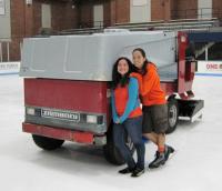 Val and Ann pose by the Zamboni while ice skating at an American Society of Mechanical Engineers event their sophomore year.