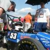 Formula SAE team members take a pit stop.