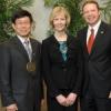 Illinois Professor Yuanhui Zhang (left) is pictured with Carole and Kent Schien, who endowed the Innoventor Professorship in Engineering.