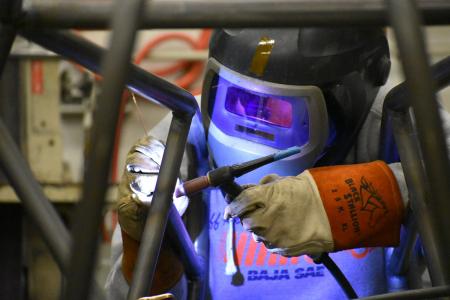 Stefanie Anderson welding for SAE Baja.