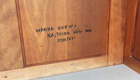 A fitting note found written on a cubicle in Grainger library. Photo by Taylor Tucker. 