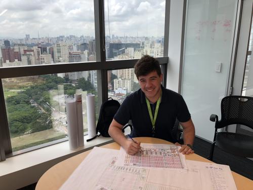 Nobre marks up a layout drawing in the Amazon corporate office in downtown SÃ£o Paulo, Brazil.