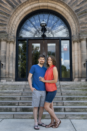Nathan and Betsy Alderman pose by the north steps of Altgeld Hall, where Nathan proposed seven years ago. Photo by Jesse Wallace.