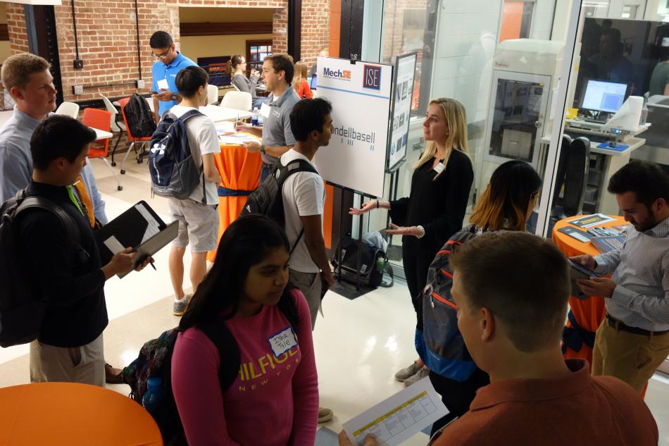 Students talk to recruiters at MechSE's Corporate After Hours event in MEL. 