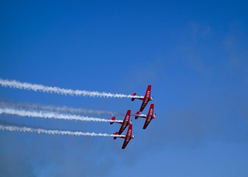 The Aeroshell T-6 Texan team flew during both daytime and night shows.