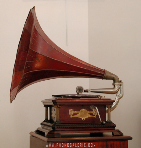 Early records were played on a mechanical music player called a gramophone. Sound was amplified through the gramophone's large horn.