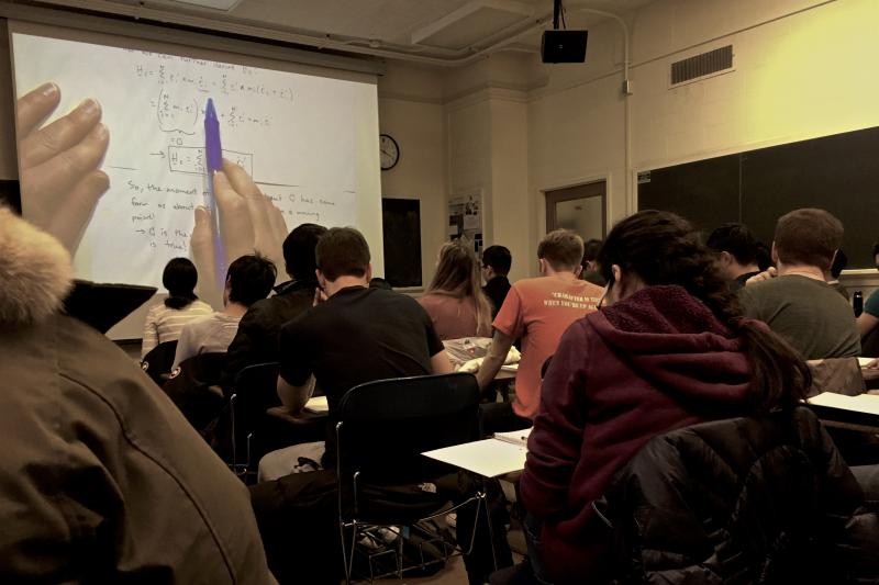 Students take notes in TAM 412.