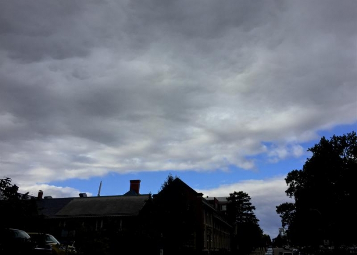A window of blue sky over MEL.