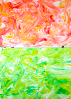 These prints were made by pressing paper on top of shaving cream colored with food dye. 