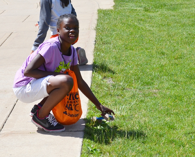 The kids, with some help from volunteers, built solar powered cars and raced them along the sidewalk. Armed with calculators, they were able to calculate their car&rsquo;s speed and as they raced along the pavement.