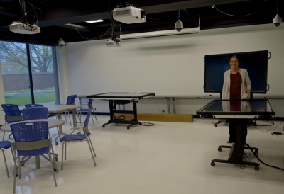 College of Education Professor Emma Mercier with her multi-touch tables in the lab classroom. Photo by Taylor Tucker. 