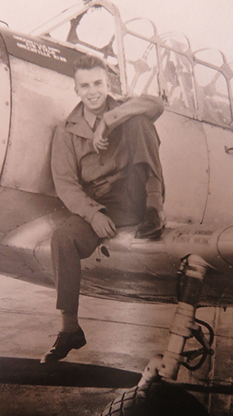 Ernie during his years in the Air Force. While in training, he was Crew Chief for the BT-13 shown. Photo courtesy of Ernie Bacsanyi. 
