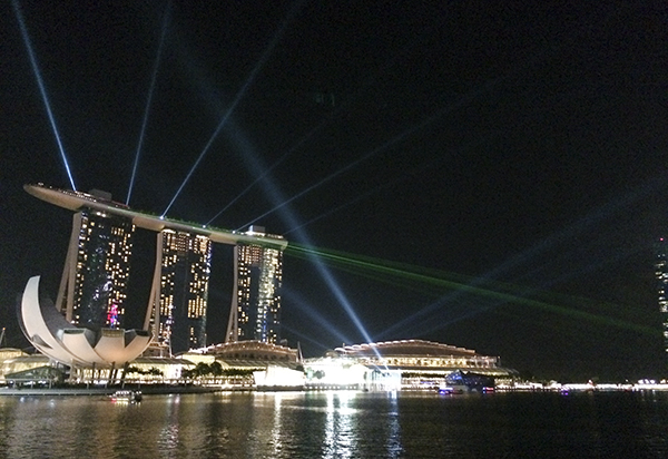 Laser light show against the Singapore skyline.