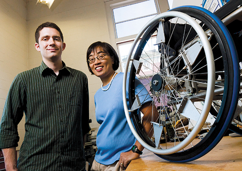 Daigle and MechSE professor Elizabeth Hsaio-Wecksler with one of the wheelchair prototypes.