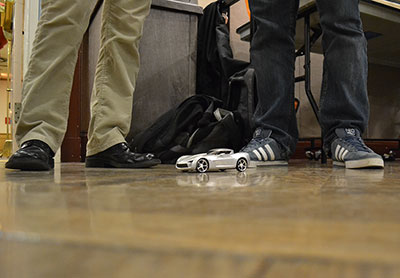 This project was designed to be a proof of concept for controlling a remote object using minimal movements (as opposed to controlling robots in bulky protective clothing) and used sensors on the gloves to maneuver a remote-control car with full capability (forward, backward, left, right). In hazardous situations where robots are warranted, a human operator can finely control a robot without having to use a bulkier, heavy, and expensive apparatus.