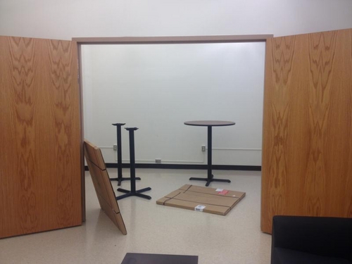 View of adjoining conference room from lounge/kitchenette.