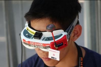 Kao wearing drone racing goggles.