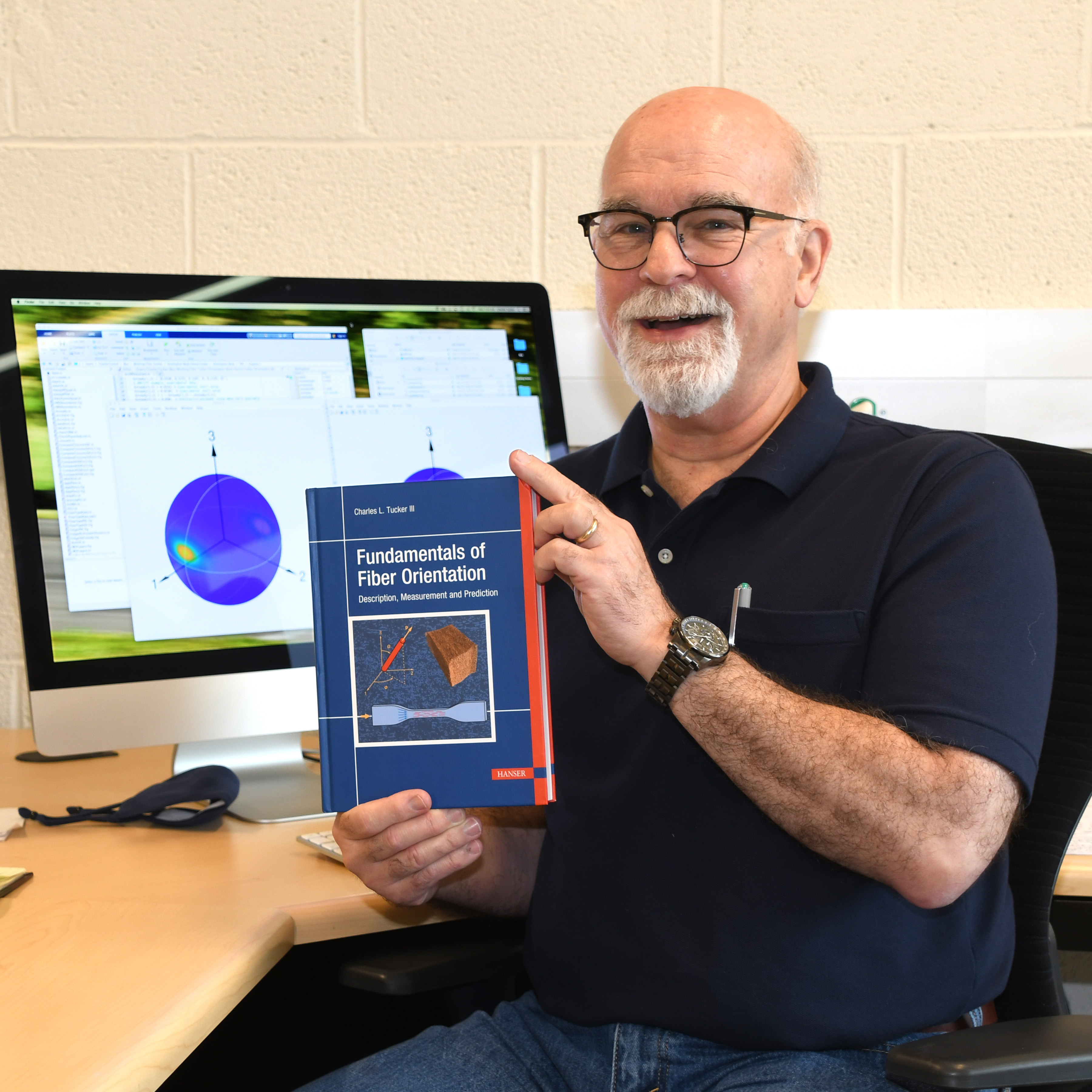 Chuck Tucker with his new book.