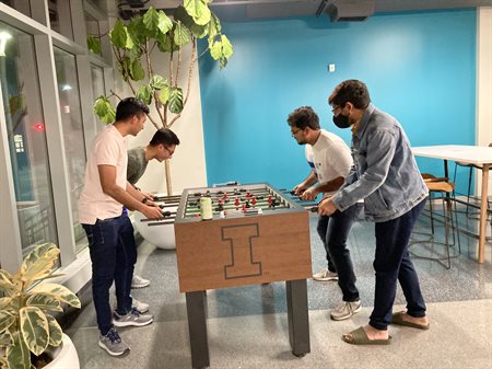 students playing foosball