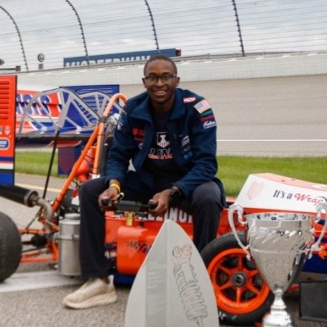 Jaden Thompson with the Illini Motorsports car.