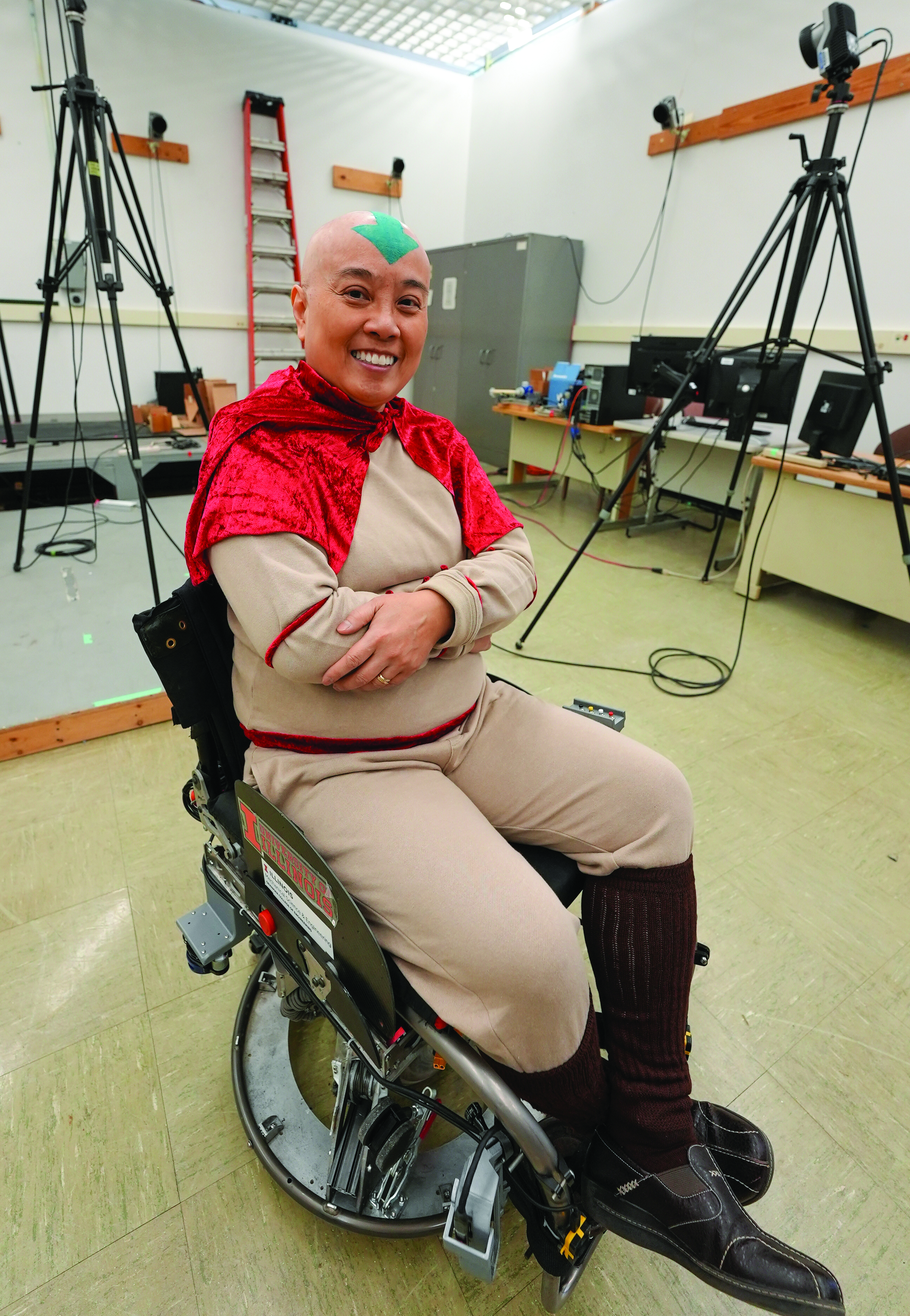 person sitting on ballbot wheelchair